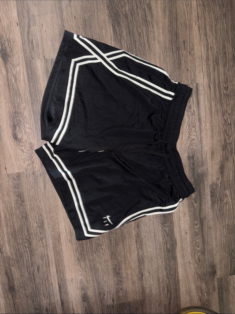 Nike Black Shorts with White Stripe Accents